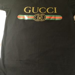 Gucci Black Tee with Gold Logo
